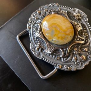 Ornate metal belt buckle w/ natural stone.